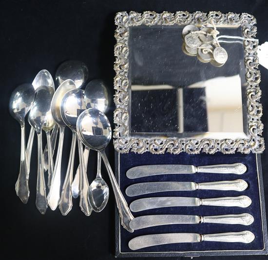 A set of six late Victorian silver buttons by Samuel Jacob, silver plated framed mirror and a quantity of plated flatware.